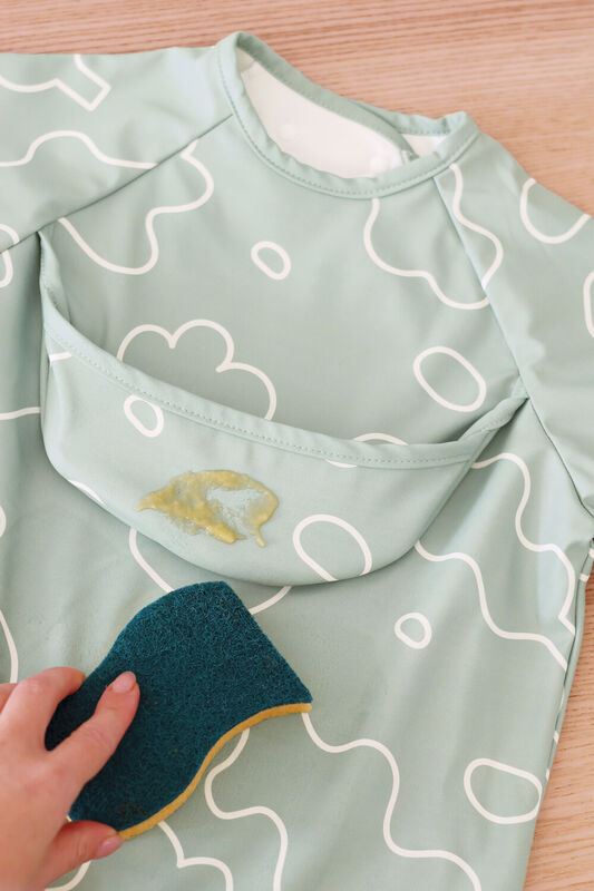 2 in 1 bib with removable sleeves Sage green